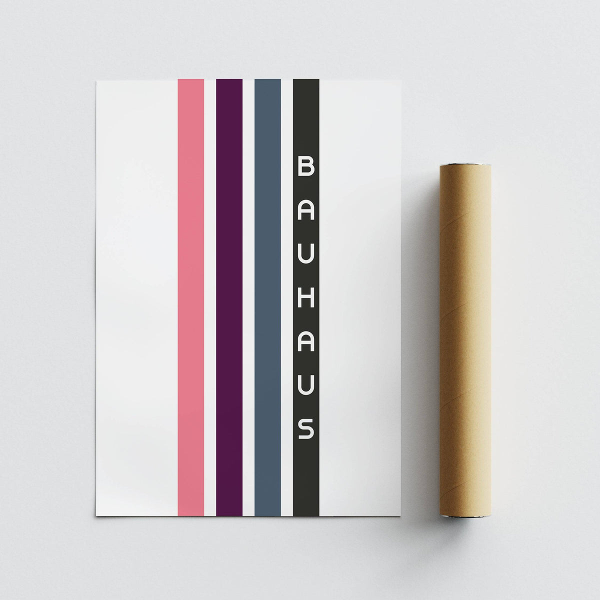 Vertical Stripes minimalist print with pink purple and grey stripes alongside a cardboard packaging tube