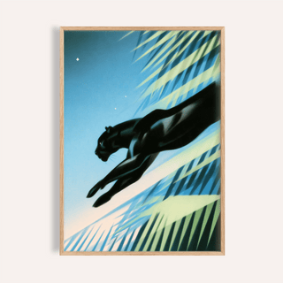 Framed Art Deco Black Panther print of a leaping black panther with blue and green leaves