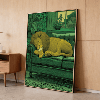 Framed Sleeping Lion Print of a lion resting on a green sofa leaning against a wooden wall
