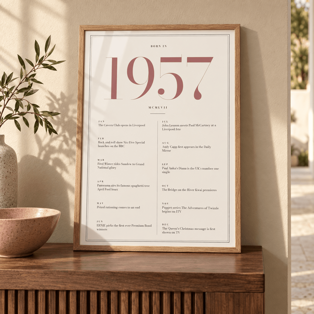 Cream and dusty rose 1957 birth year print in a calm room setting