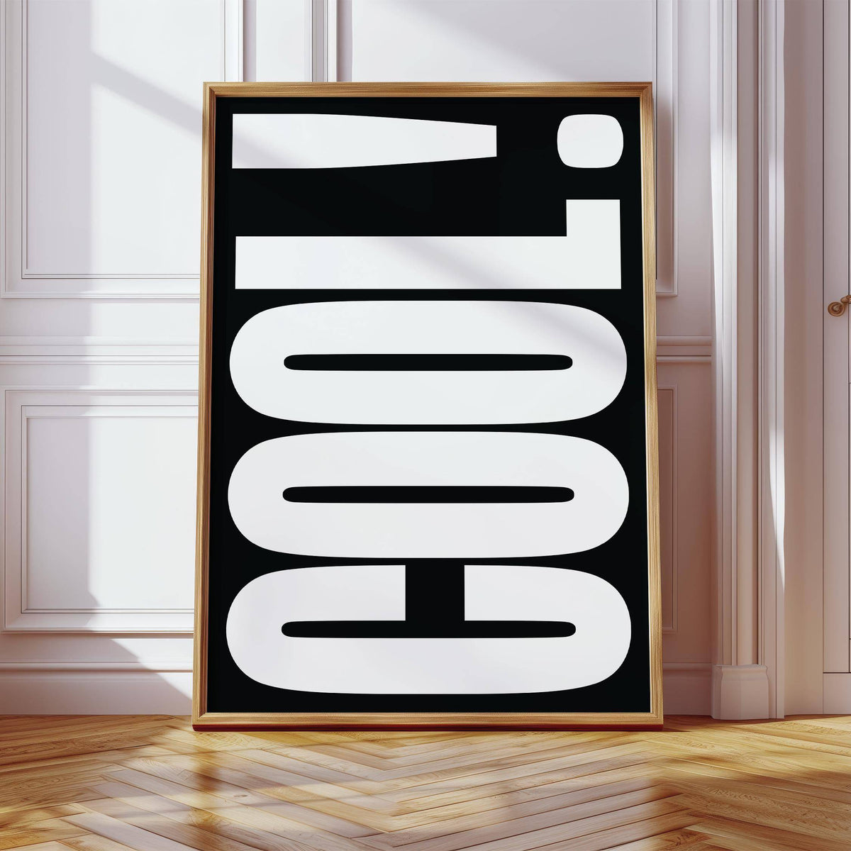 Cool Typography Art leaning in a white room with wood floor and sunlight shadows