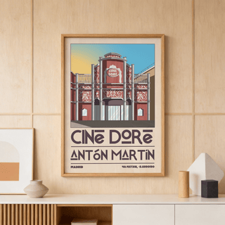 Framed Madrid Landmark Poster of Cine Dore cinema facade in red and blue on a wooden wall