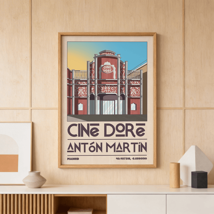 Framed Madrid Landmark Poster of Cine Dore cinema facade in red and blue on a wooden wall