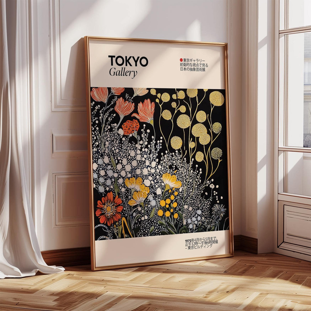 Print leaning on a floor with vintage Japanese wall art of stylised flowers in orange yellow and white