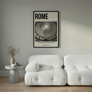 Pantheon Interior Poster framed print hanging above a white sofa with a side table and dried flowers