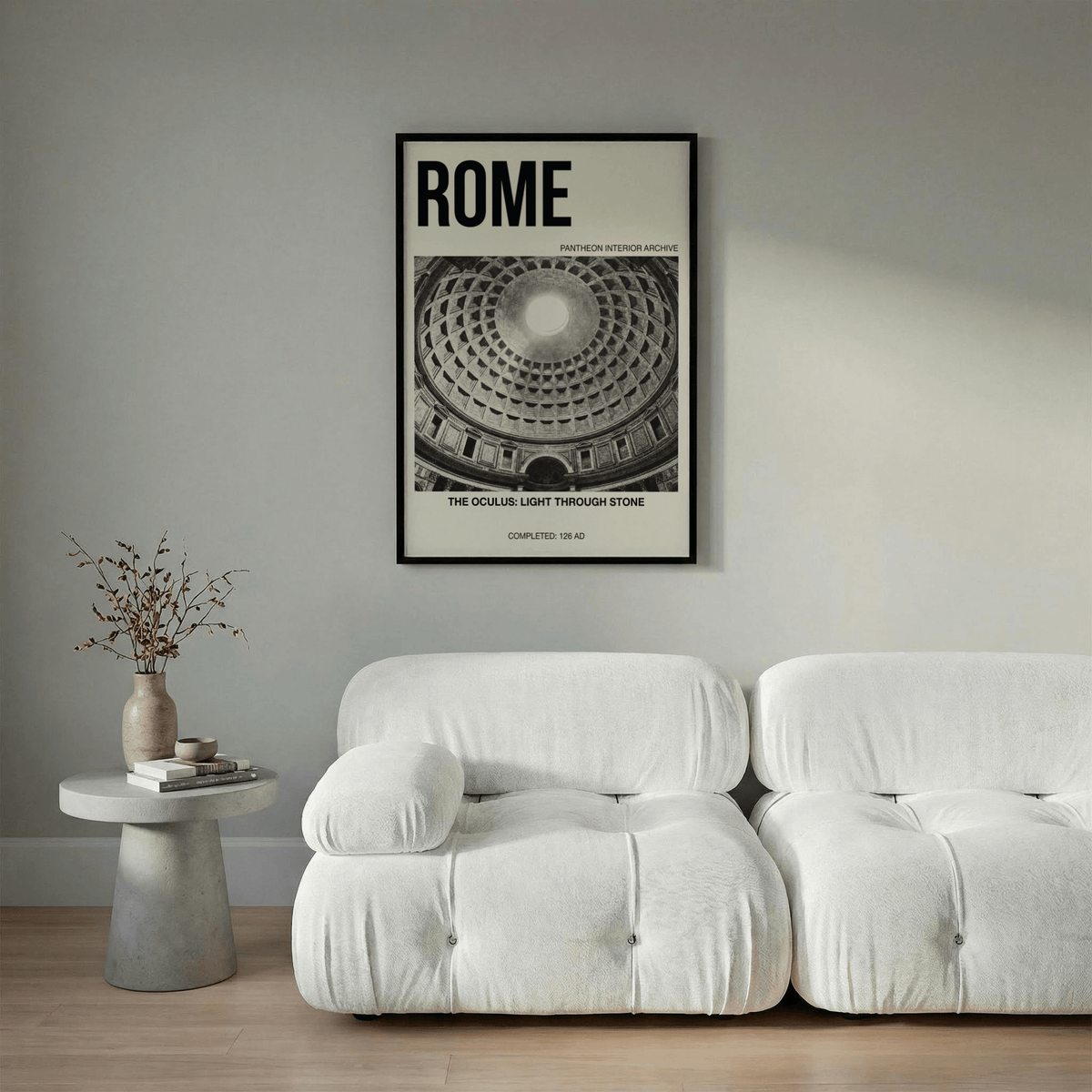 Pantheon Interior Poster framed print hanging above a white sofa with a side table and dried flowers