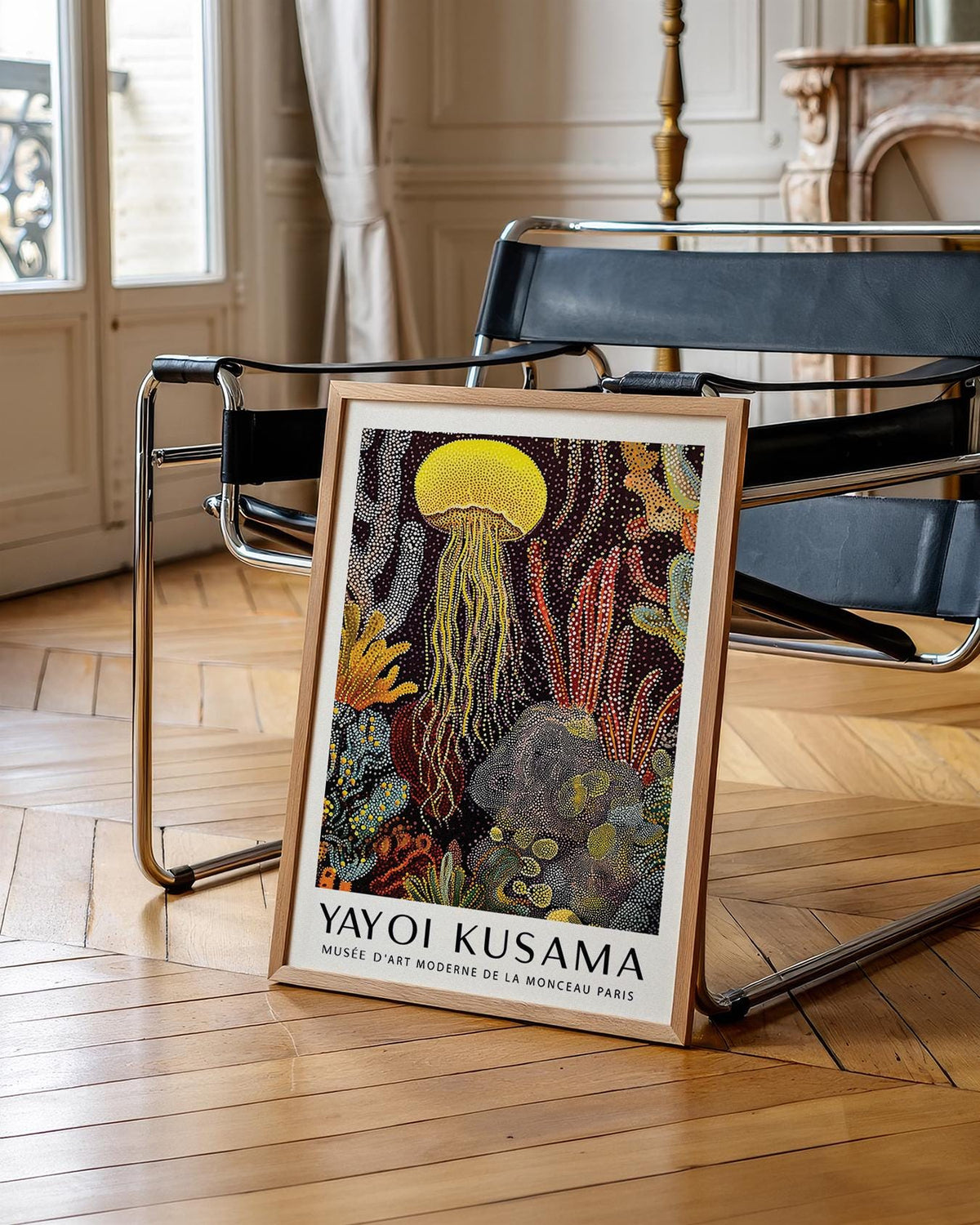 Framed Jellyfish Poster with yellow jellyfish and polka-dot coral leaning on a chair