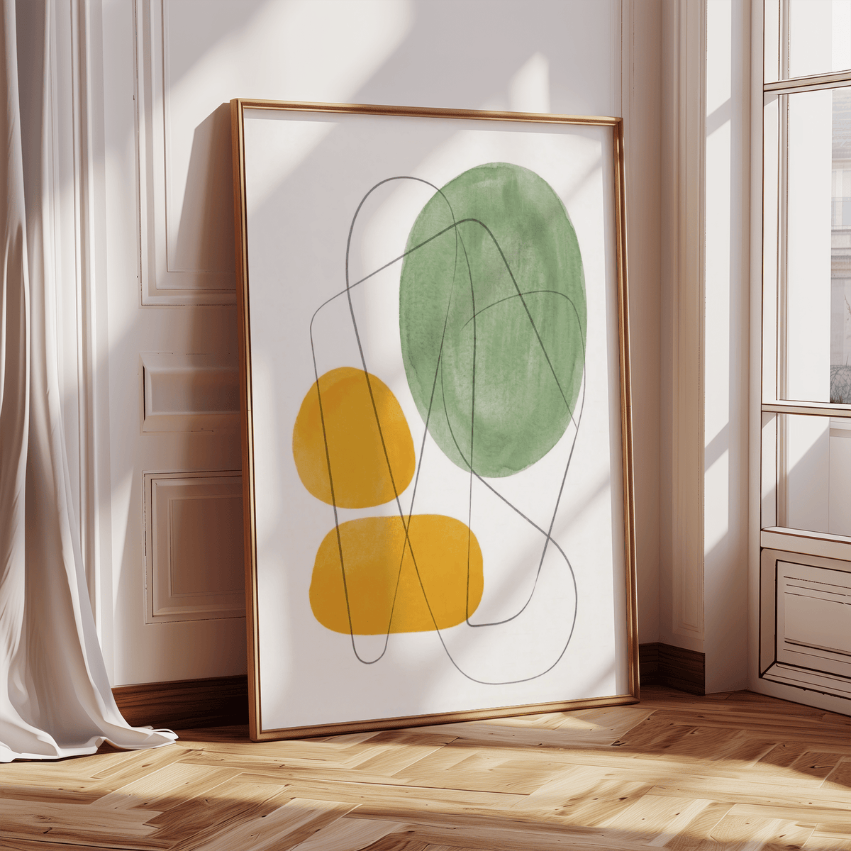 Print leaning on floor with abstract organic shapes in yellow and green in natural light
