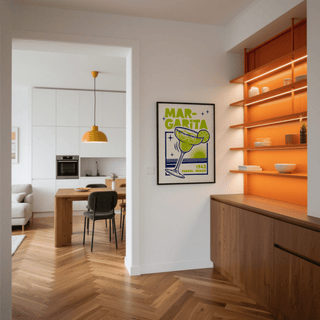Margarita Art print on a white wall with orange shelves beside it and a kitchen in the background