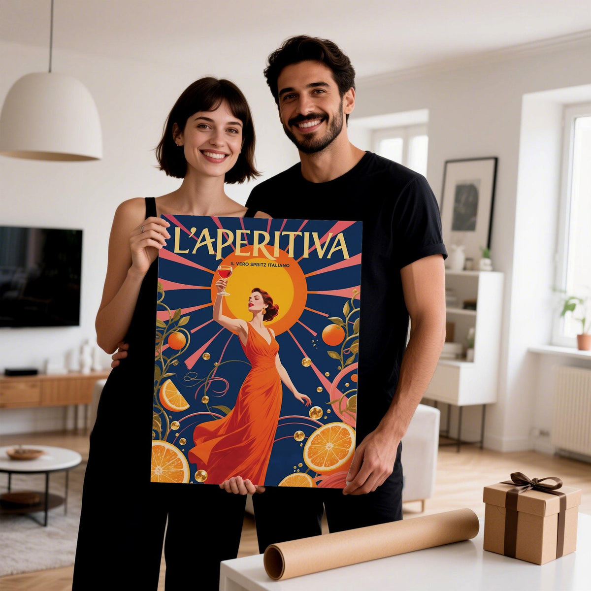 Spritz Gift held by a smiling couple showing a woman in a red dress holding a drink with bright orange and navy colours