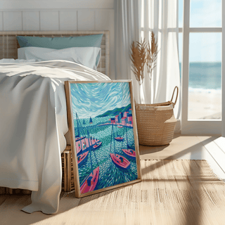 Print leaning on floor featuring sailboats wall art in blue and pink by a basket and bed near a beach window