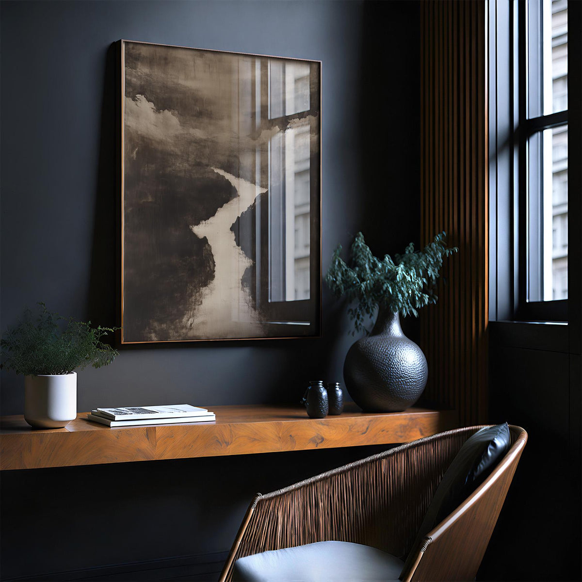 Sumi e Art wall art of a minimalist river landscape in black and white hanging above a wooden shelf in a room