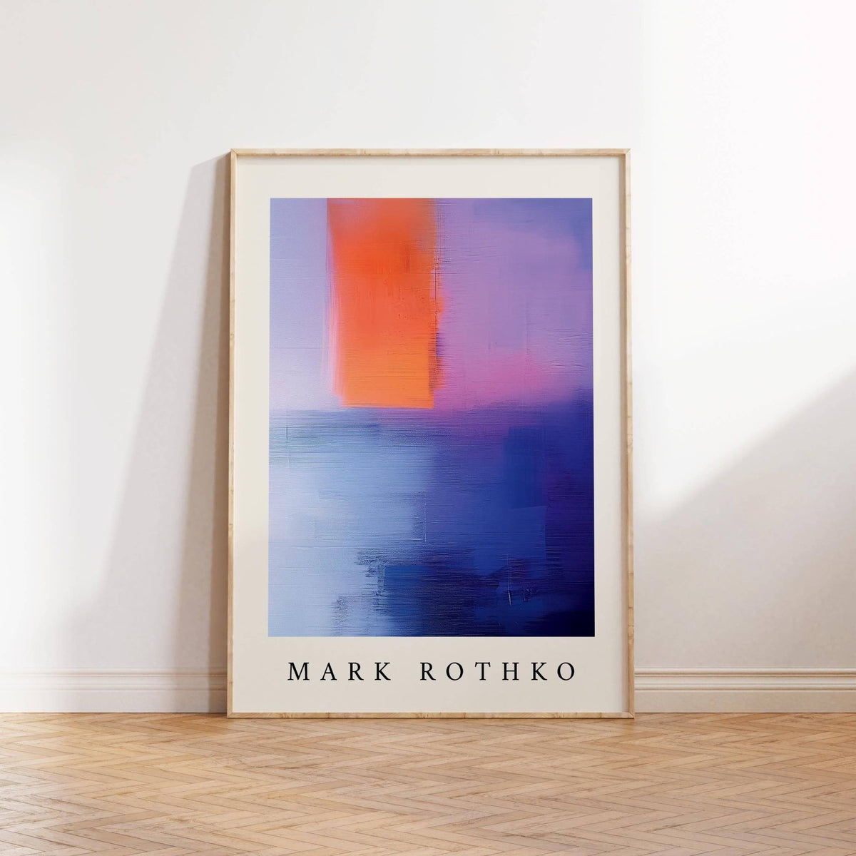 Rothko Art leaning print with bold orange and blue abstract blocks on a wooden floor