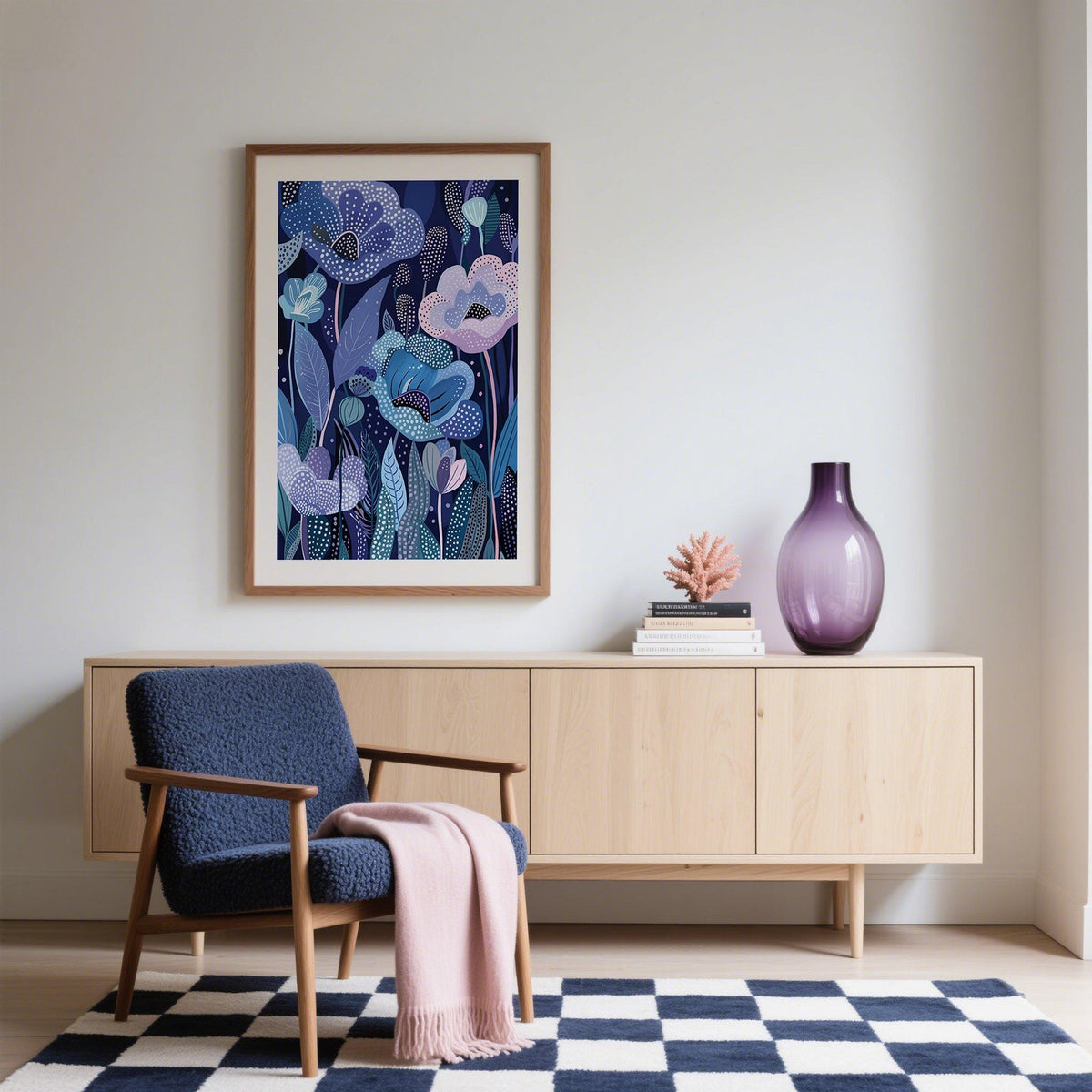 Purple home decor with abstract floral art in blues and purples above a minimalist wood sideboard with a purple vase
