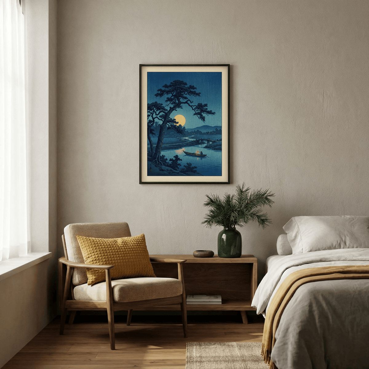 Moonlight Print hanging above a wooden sideboard with a green vase and plant in a bedroom