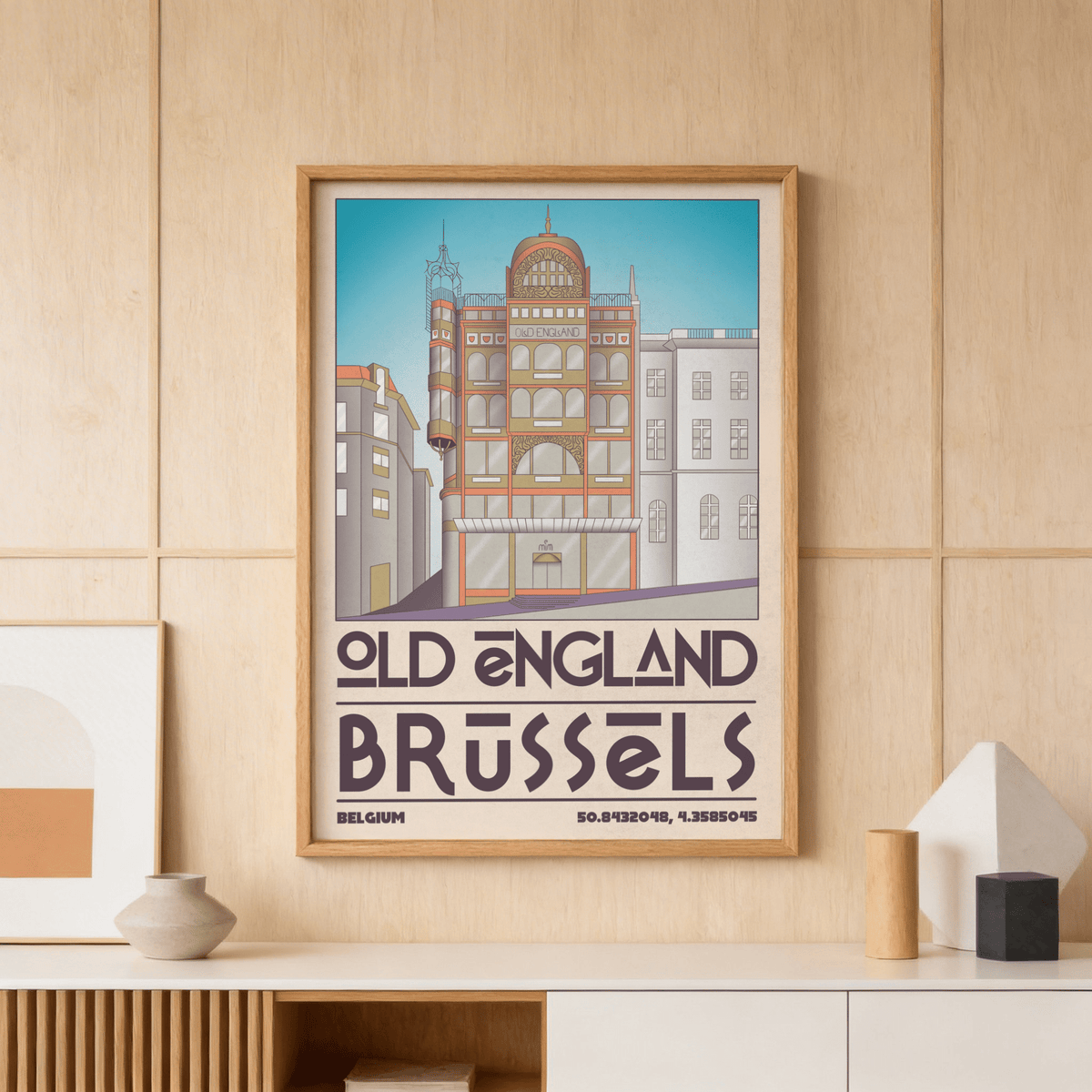 Brussels Architecture Print framed print of an illustrated Old England building with blue sky on a wooden-panel wall above a wooden