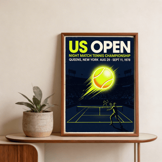Framed New York Tennis Championship Poster with a large glowing neon yellow tennis ball and players on a dark court beside a green plant
