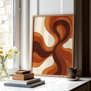 Organic Line Poster print leaning on a window sill with brown and orange flowing lines and a cup nearby