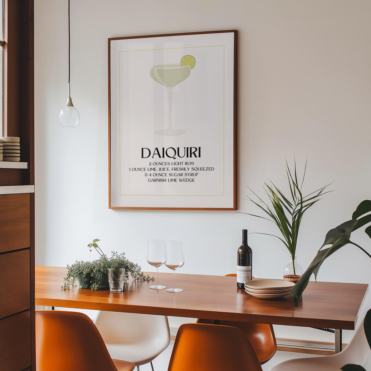 Kitchen Pictures Decor print of a daiquiri cocktail with lime green and black text above a wooden dining table with glassware