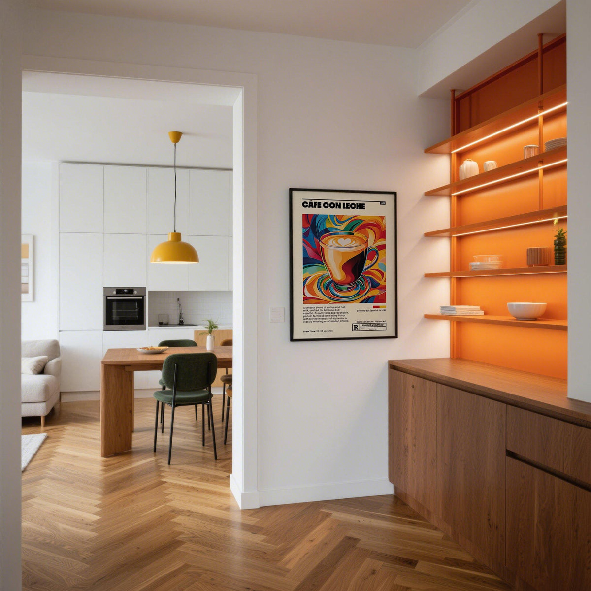 Cafe Con Leche Art print in a black frame on a white wall near orange shelving in a modern open space