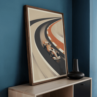 Vintage Motorsport Poster leaning on a sideboard with a black vase in a blue corner