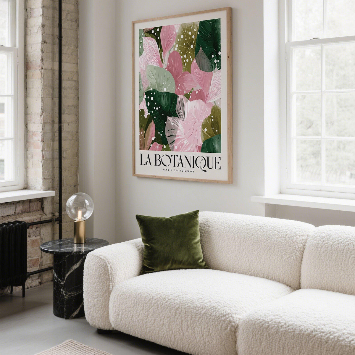 High Quality Art Prints botanical leaf artwork with pink and green tones above a white sofa with a green cushion