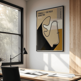 Framed Sao Paulo Race Circuit Diagram Poster with muted beige and black tones above a minimalist workspace