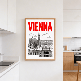 Print on a wall of Vienna cityscape print with red text and black line-art in a kitchen