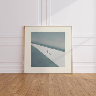 Art Prints Square leaning against a wall showing a solitary person in shadow minimalist photographic print