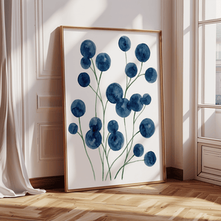 Watercolor Flower wall art leaning on floor with blue botanical flowers in natural light