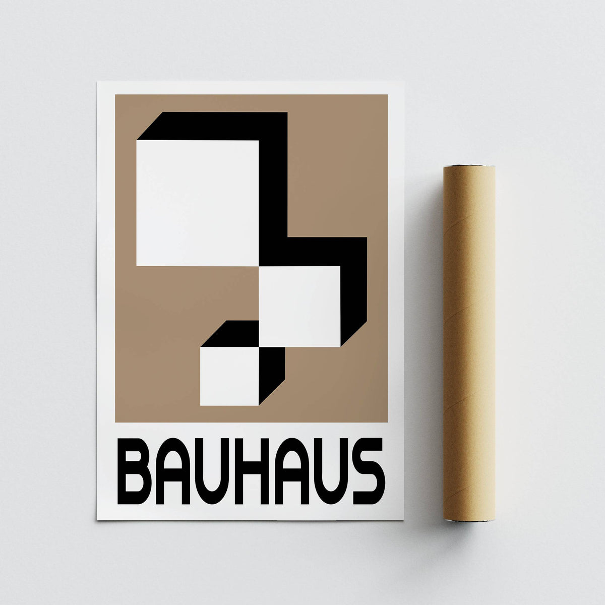 Geometric wall hanging with white and black geometric blocks next to a brown packaging tube