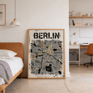 Berlin City Map wall art leaning on the floor in a bedroom with a pendant lamp and wooden bed frame