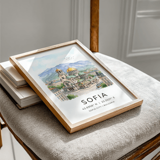Framed Sofia City Art Print leaning on a chair with neutral cushions in watercolour style