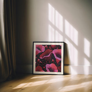 Print leaning on floor of Pink Florals abstract pink and red poppy flowers illuminated by window light
