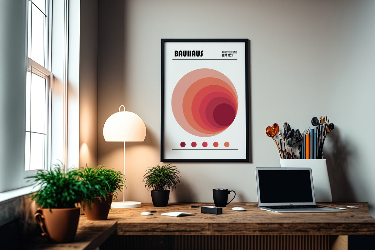 Wall Art Office with concentric circles in shades of red in a minimalist style above a wooden desk