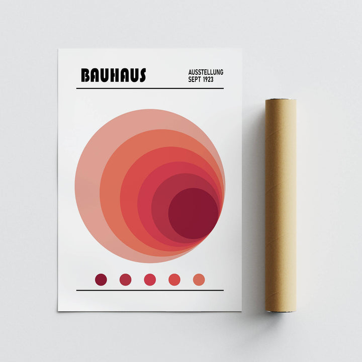 Wall Art Office print featuring concentric circles in red shades with a packaging tube beside it