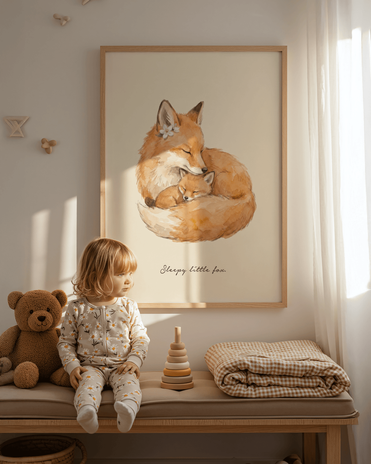 Sleepy Fox Art Print of a mother fox and kit in soft watercolour tones in a child's bedroom with a teddy bear