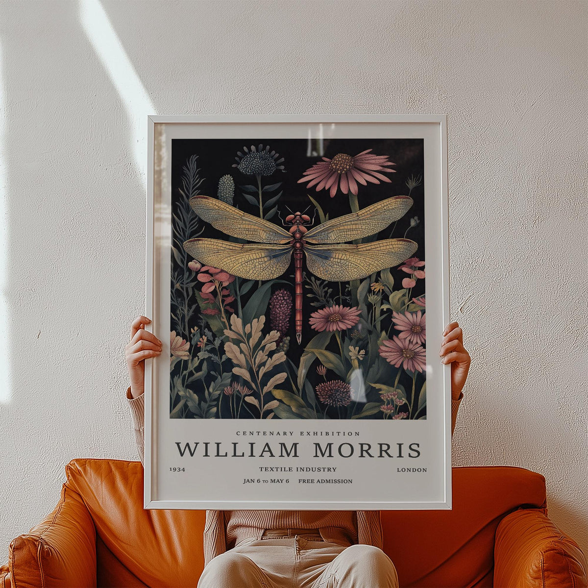 Print held in hands of dragonfly art print with vintage botanical flowers and art deco style