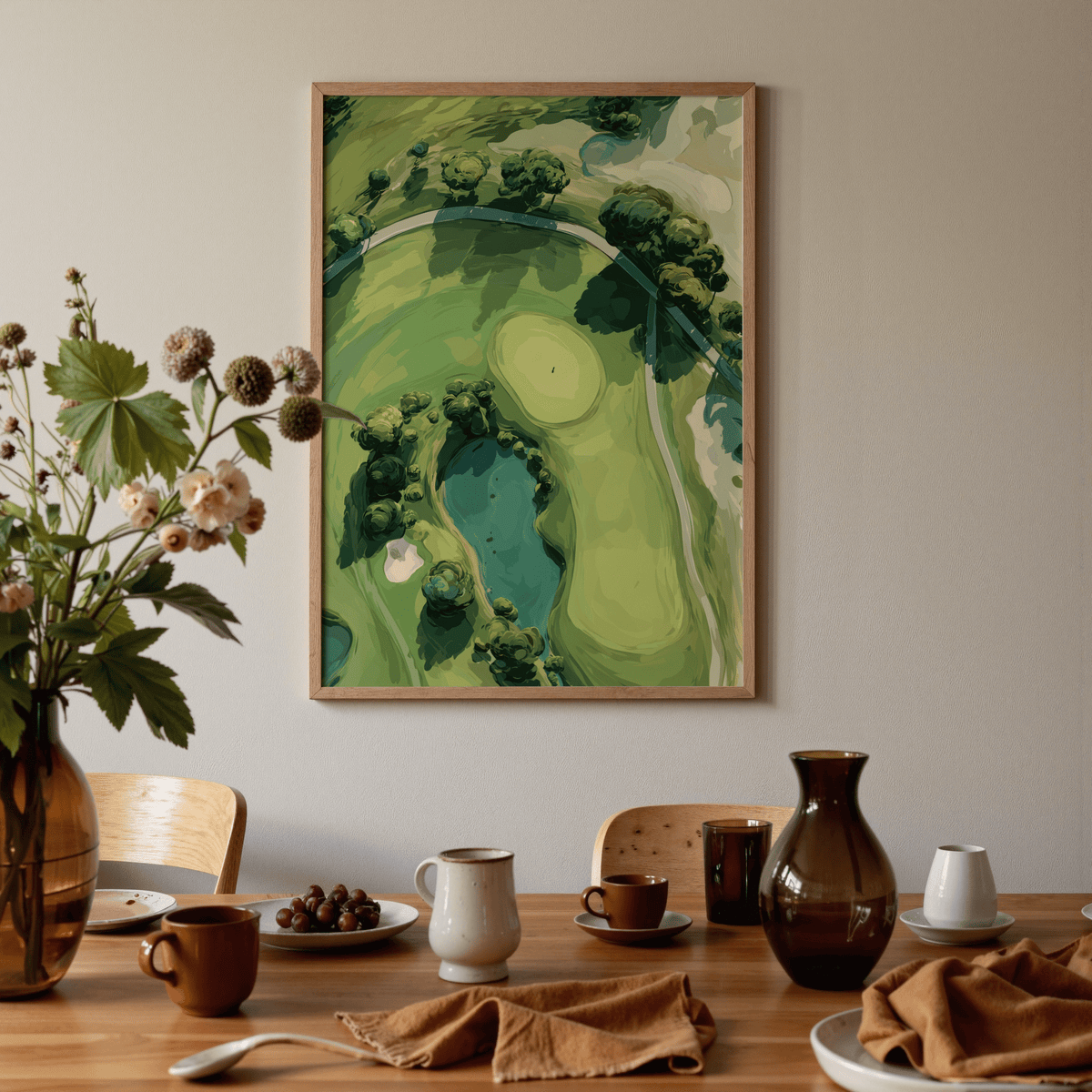 Aerial Golf Landscape Poster in a dining room with brown ceramics on a wood table