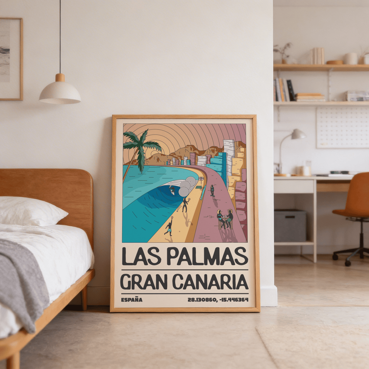 Print leaning on the floor of a Las Palmas Art Print with retro beach scene in warm colours near a brown bed
