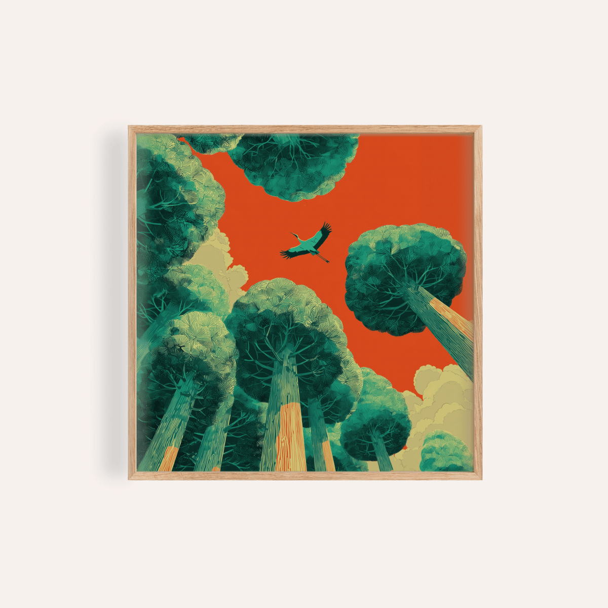 Framed close-up of bird in flight wall art with green trees against an orange sky
