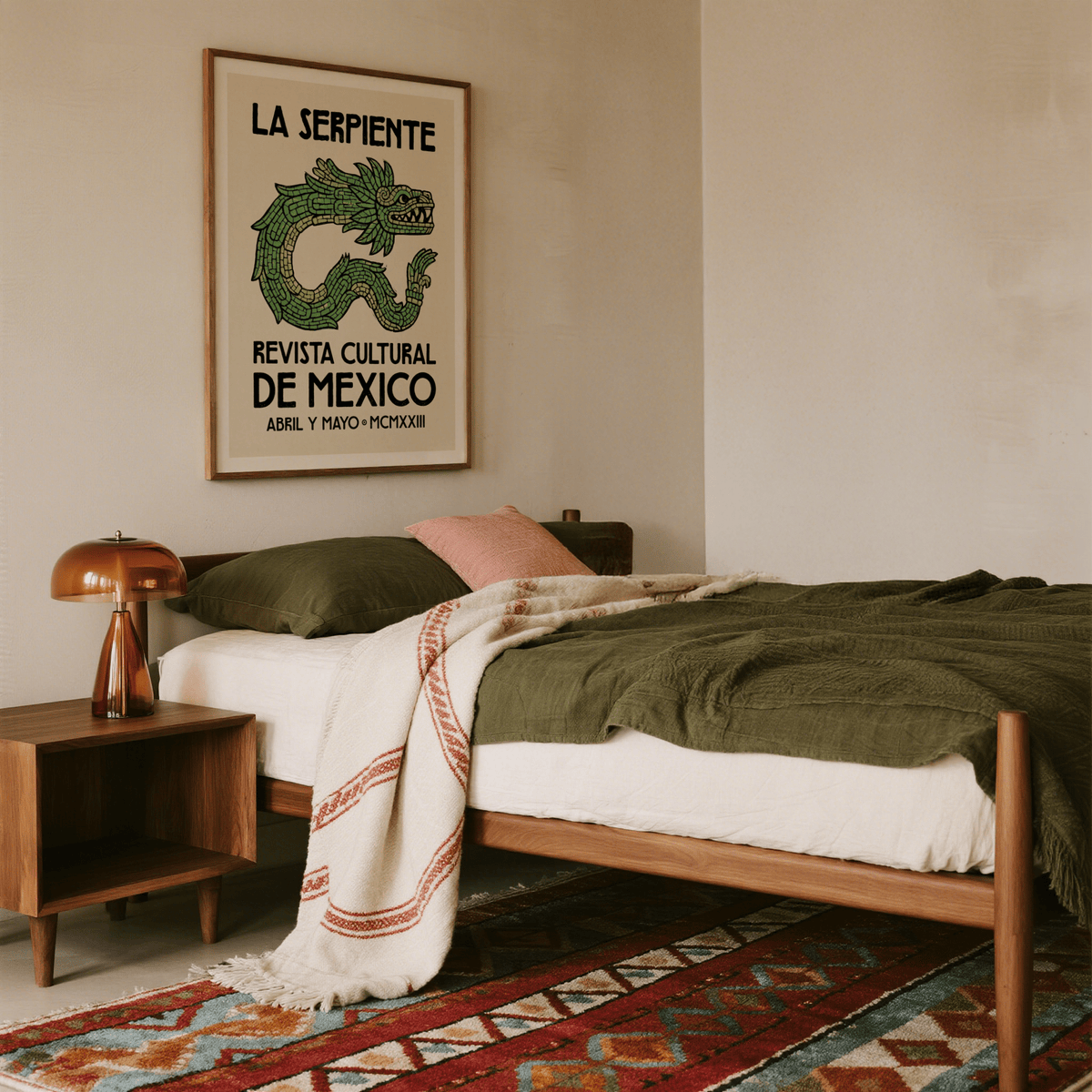 Serpent Cultural Art Print of Aztec serpent deity in green and black above a wooden bedside table in a bedroom