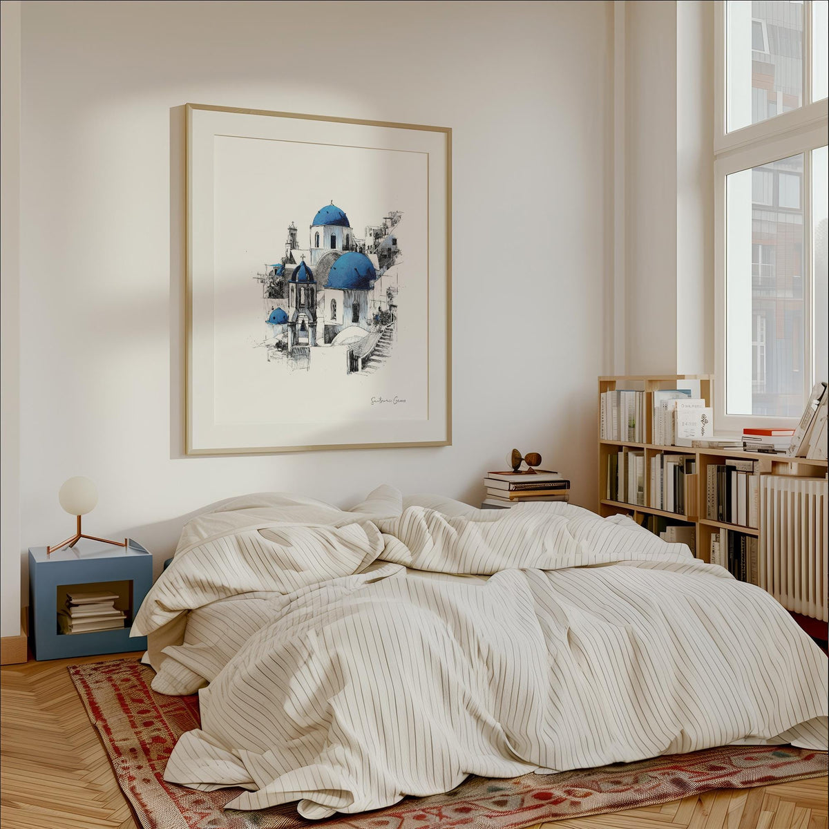 Santorini wall art showing blue domed churches in line-art and watercolour above a bed in a beige bedroom