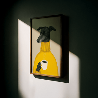 Framed Illustrative Dog Wall Art with a black dog in a yellow sweater in shadowed light