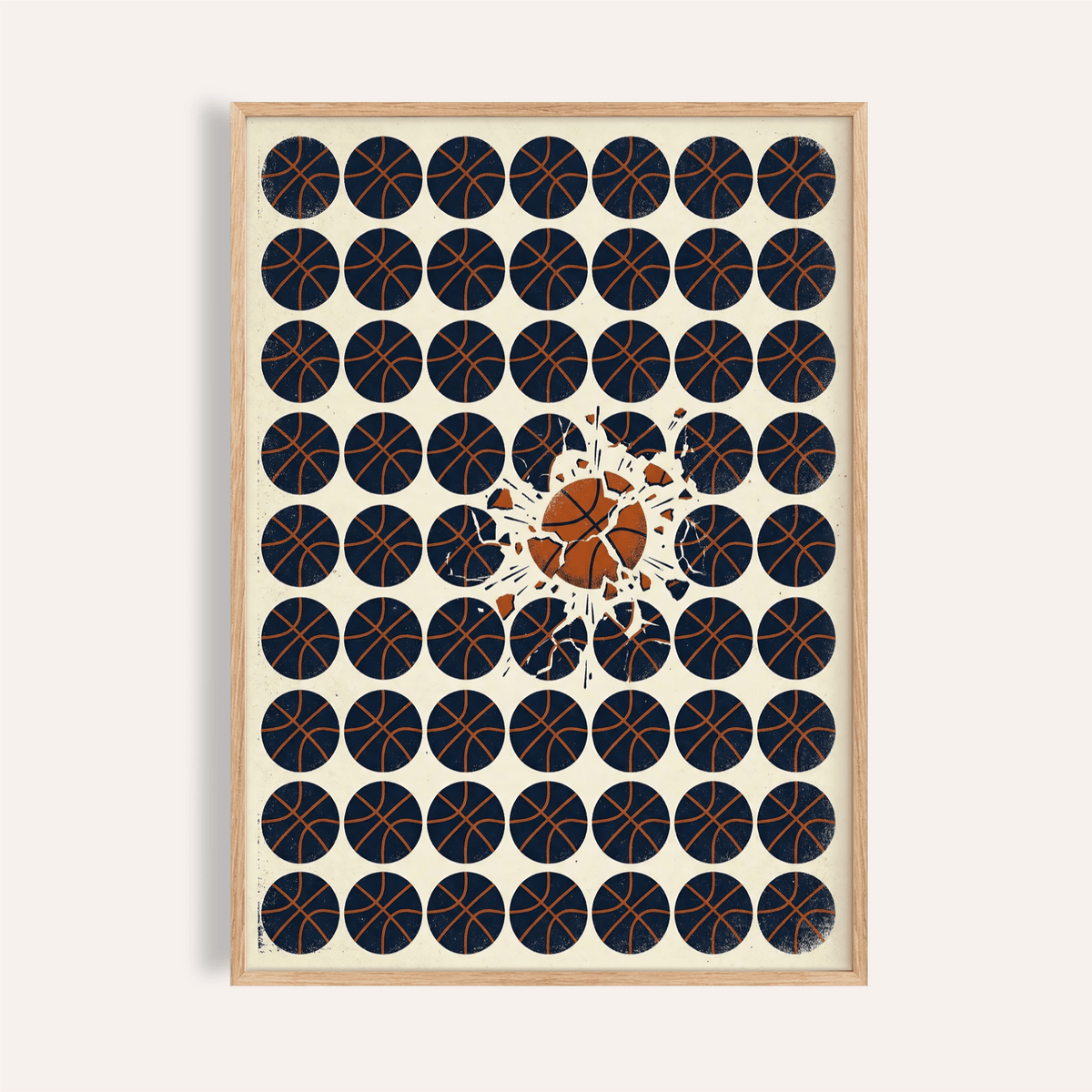 Framed Basketball Burst Art Print showing minimalist pattern of dark basketballs with one bursting orange ball