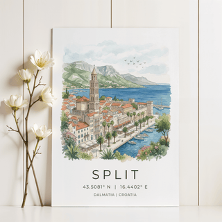 Split Dalmatia art print leaning on a white wall with flowers beside it