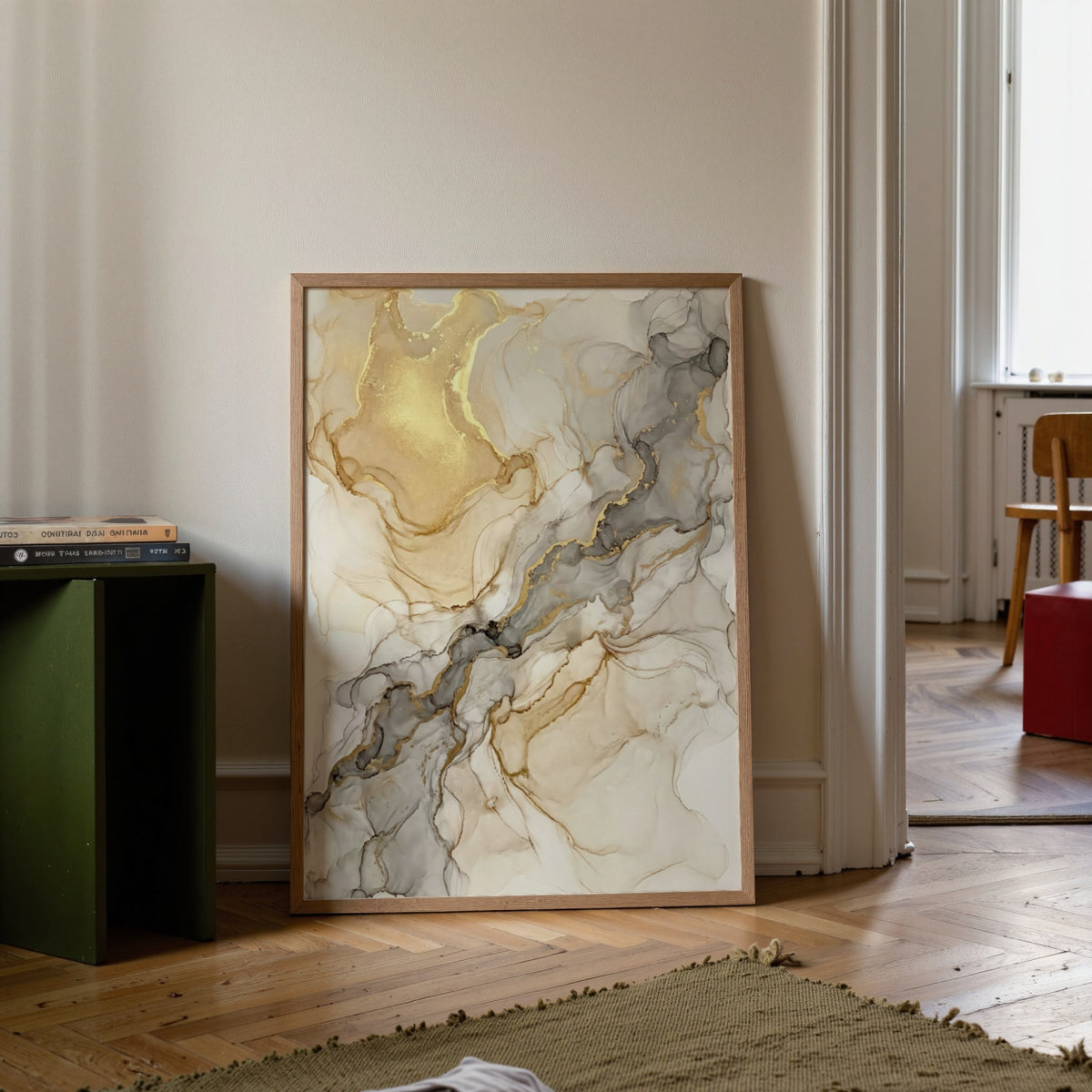 Beige Abstract Print leaning on a wooden floor next to a green side table with books