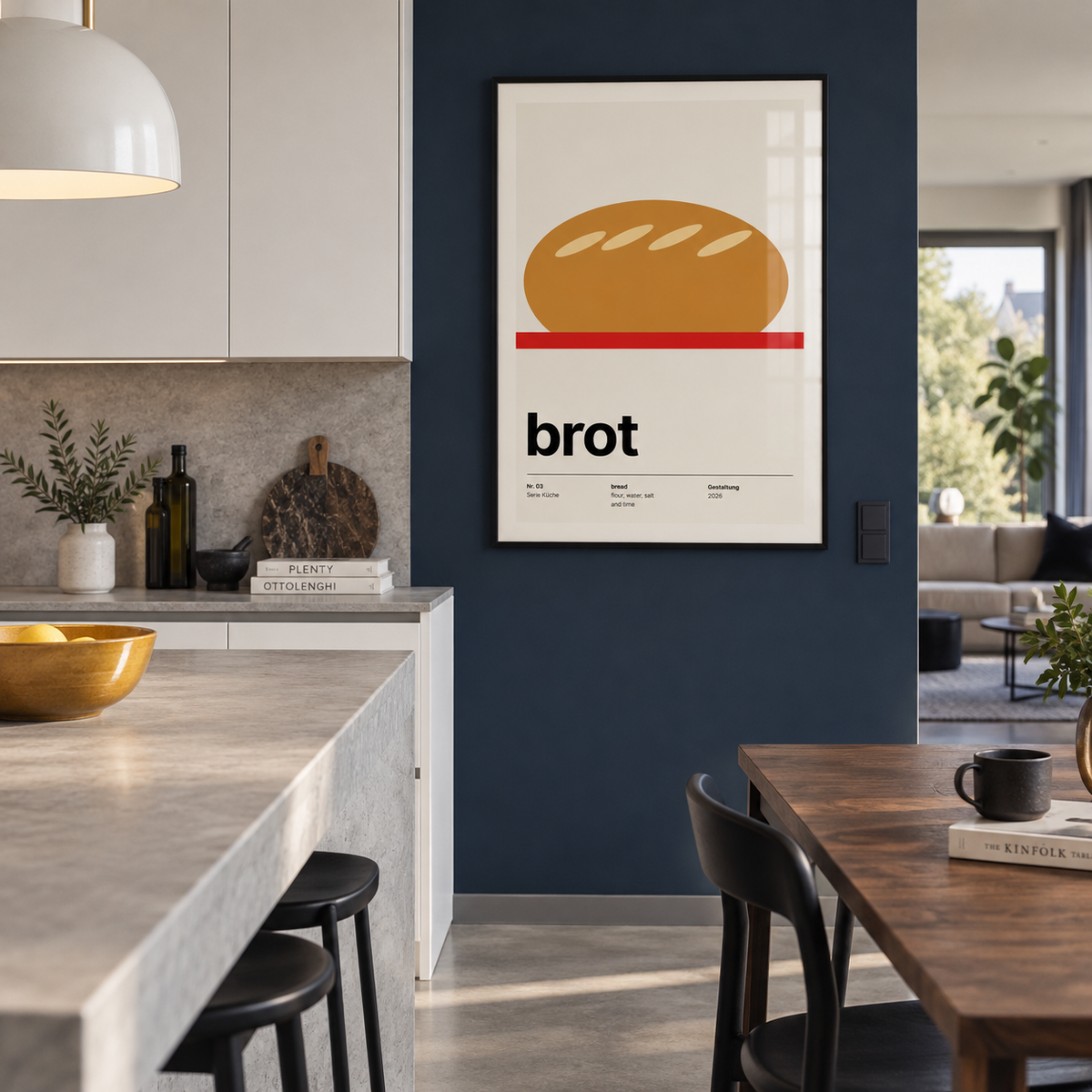Golden loaf typography print in an open kitchen against a navy wall