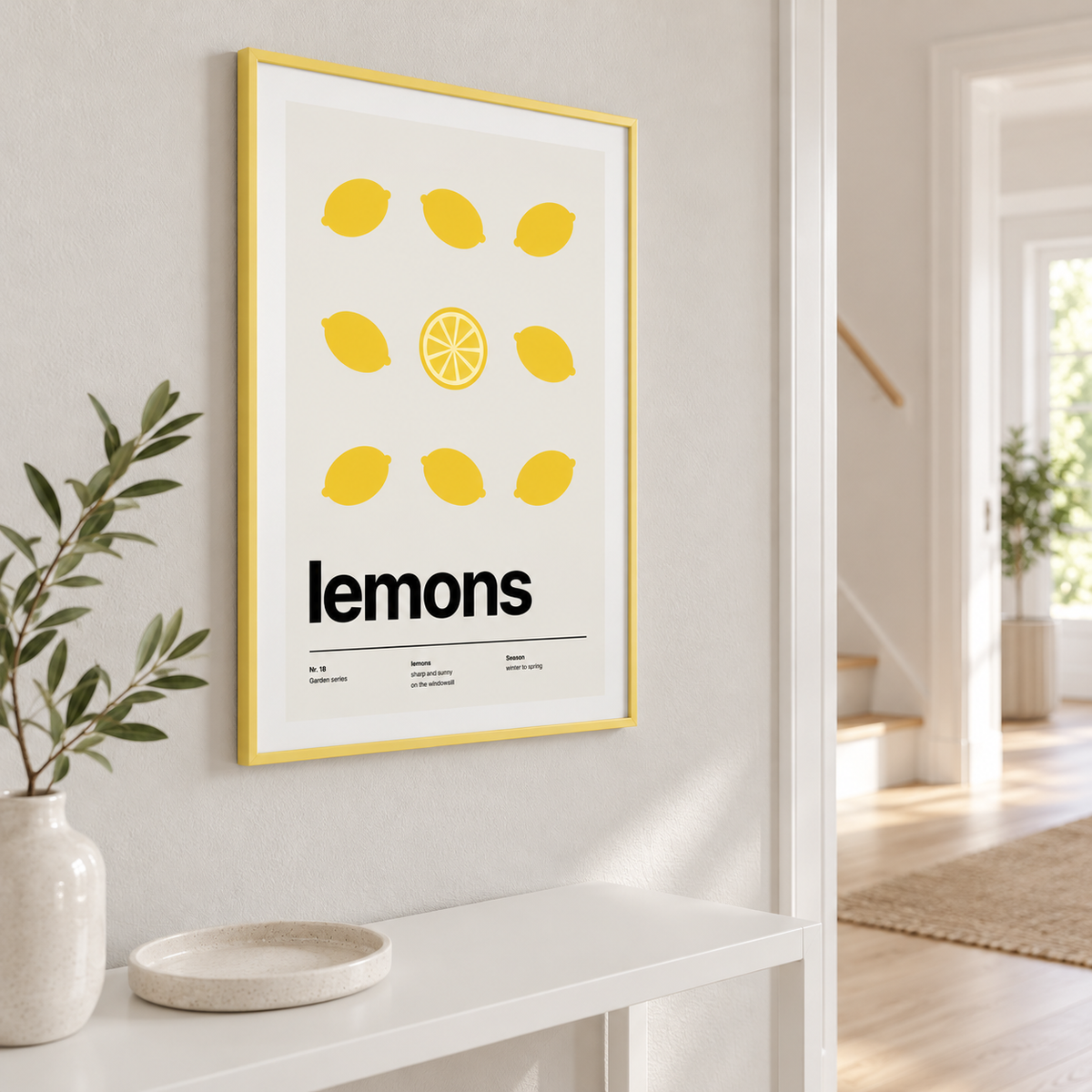 Lemons with one cut in half on the wall of a bright hallway