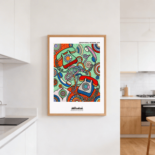 Vintage Telephone Art Print leaning on a white kitchen wall with modern cabinets and wooden floor visible